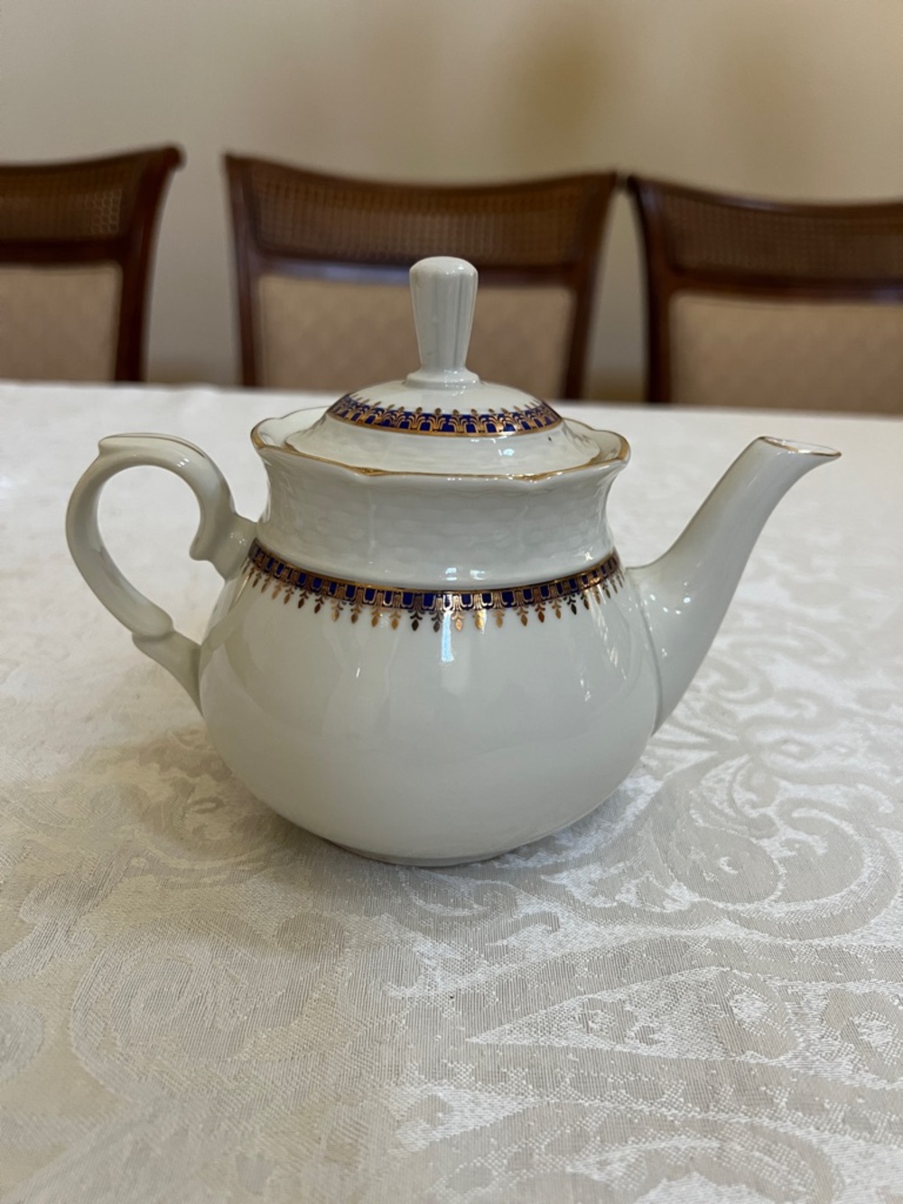 Classic White Porcelain Teapot with Blue and Gold Trim